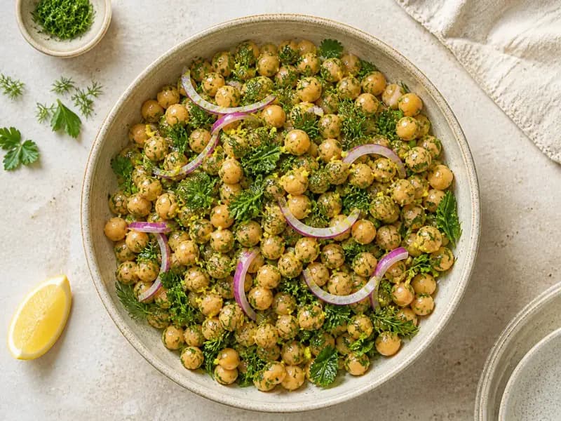 Lemony Chickpea and Herb Salad — shot from directly overhead: chickpeas dressed while they are still warm so they drink the lemon and oil