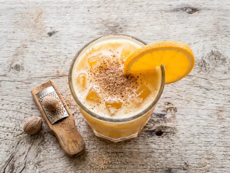 Painkiller — shot from directly overhead: dark rum with pineapple