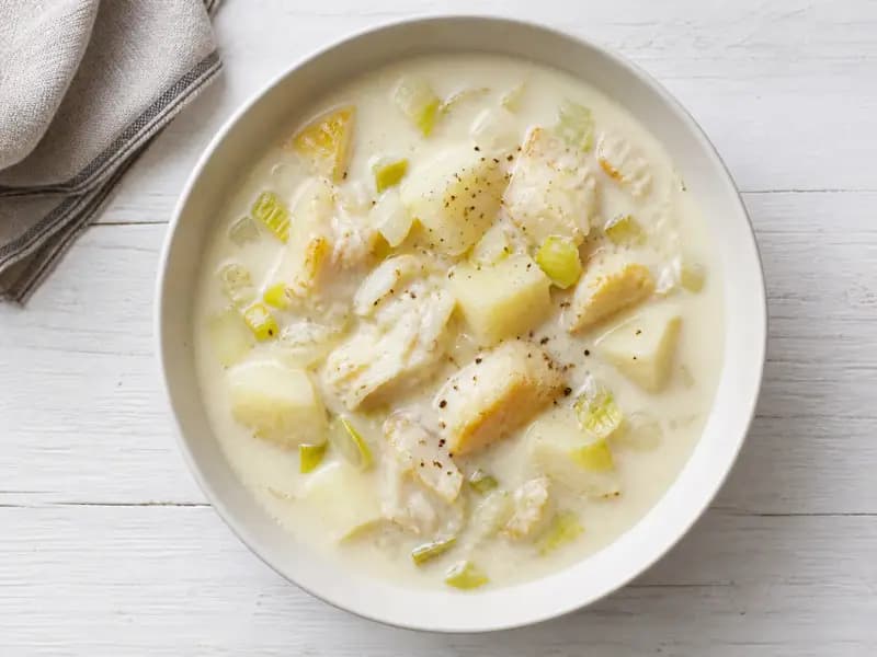 Smoked Haddock Chowder — shot from directly overhead: undyed smoked haddock poached in milk